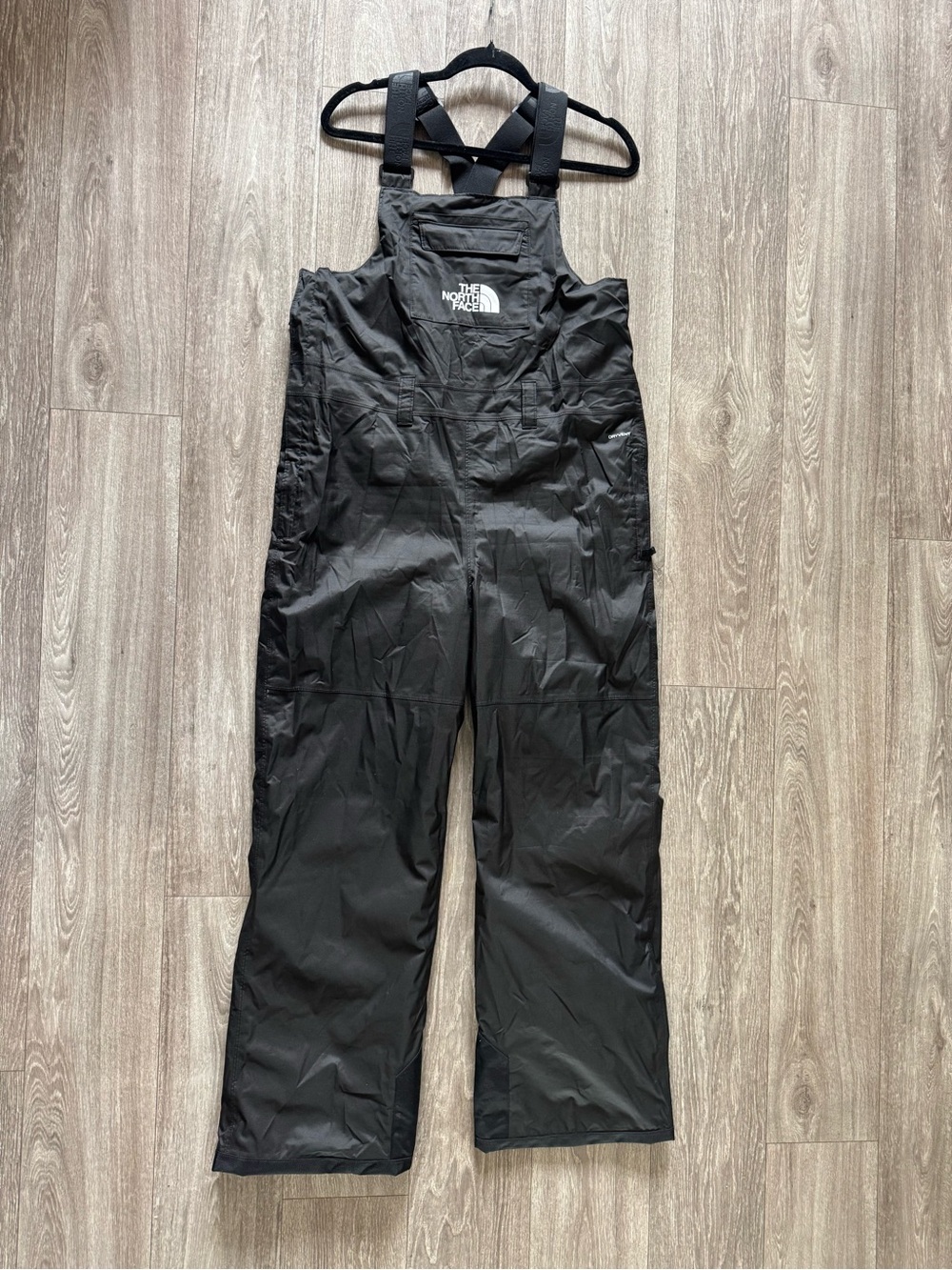 The North Face Black Jacket Interior Label with E-Z Grow Bib